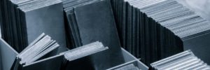 pile of metal sheets with a variety of sizes and shapes. concept of organization and structure industrial concept background